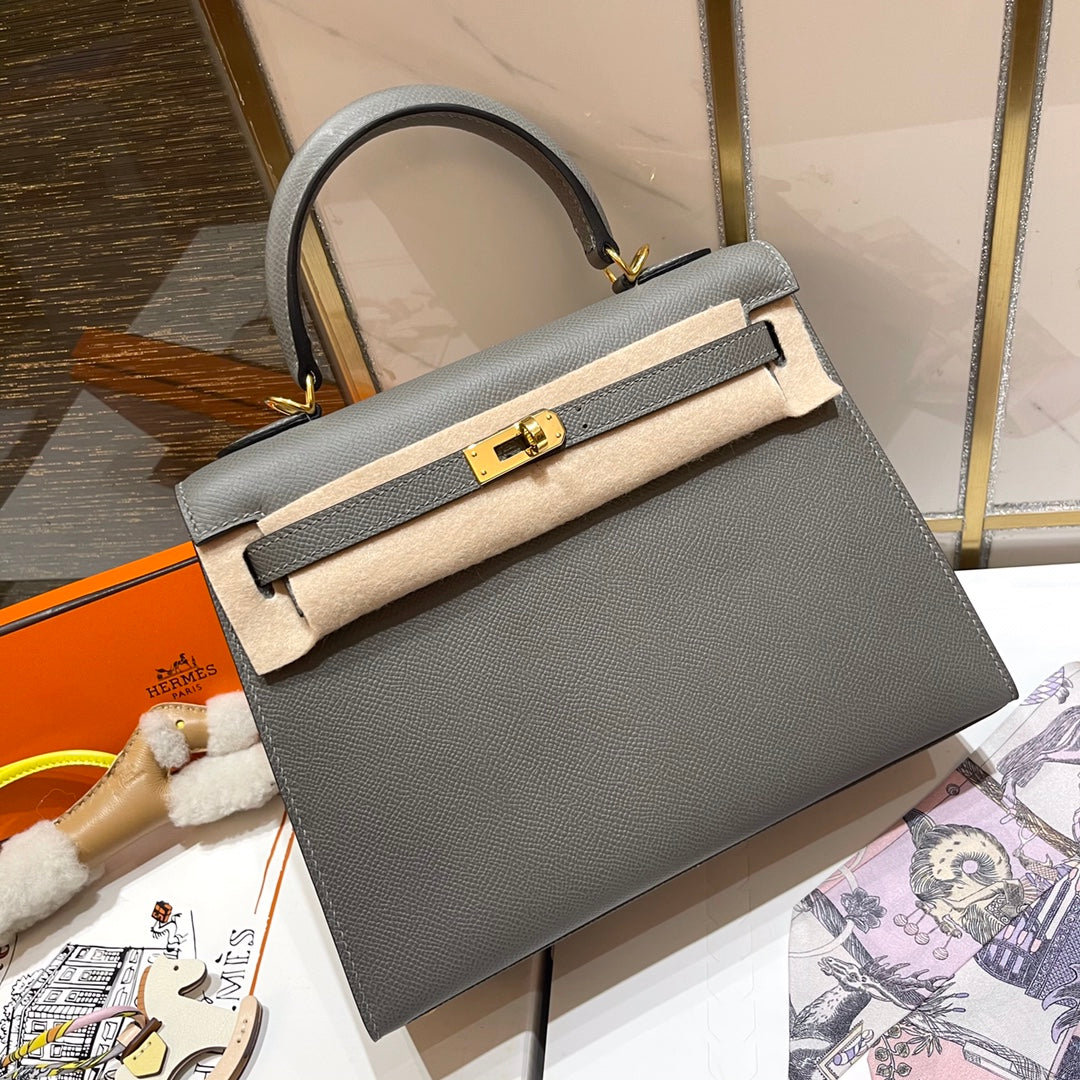 13342610430442752_1800x1800_0558eb4c-a165-4c84-a496-524c52858da9-2.jpg HM KELLY 25CM GRIS MOUETTE GOLD HARDWARE - Image 1