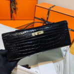 KELLY CUT 31 IN BLACK SHINY  CROCO-EMBOSSED WITH GOLD HARDWARE