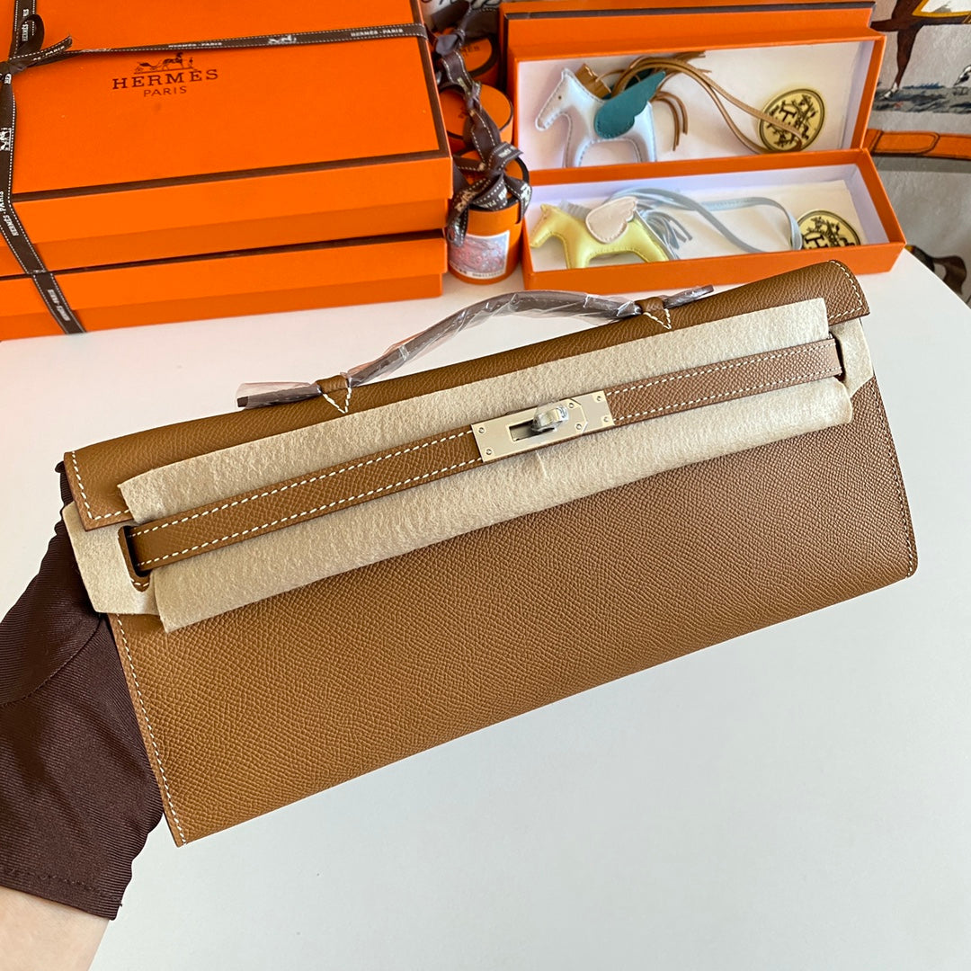 20220623_i1655976624_4057_0_jpg_1800x1800_5c534170-f78d-47c7-a588-c78a279eda29-2.jpg KELLY CUT 31 IN BRONZE BROWN WITH SILVER HARDWARE - Image 1