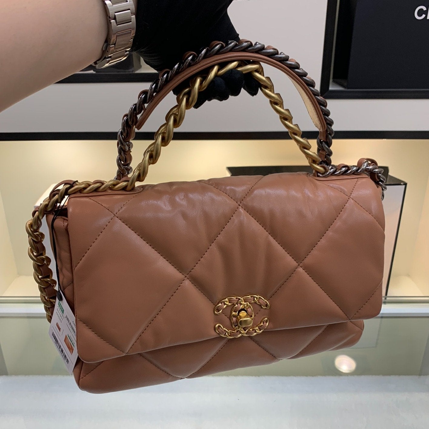 38605166-7d9f-48b2-b08c-c4d8382596d6_1800x1800_b94b7831-ae60-4d90-98f8-85f309b66e29.jpg 19 FLAP BAG 26 BROWN GOATSKIN - Image 1