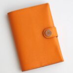 HERM R.M.S Passport Holder in Apricot Evercolor