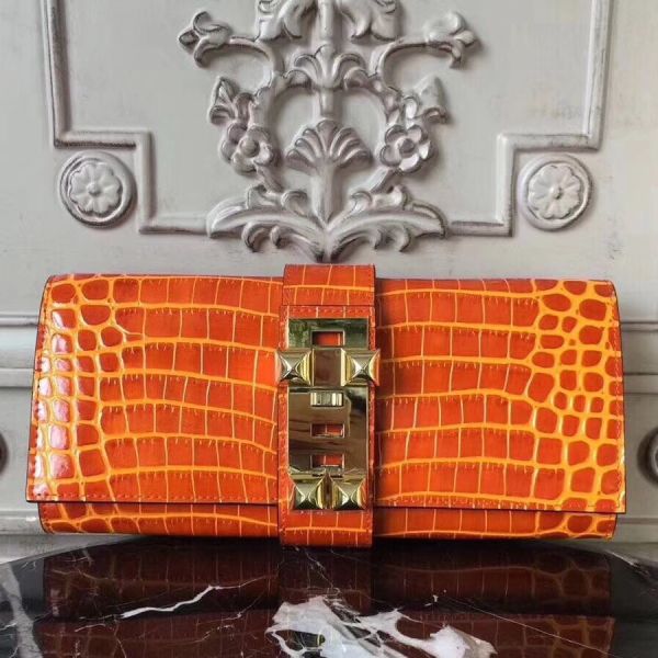 hm29cror_1800x1800_ededb76e-b3fb-4cb5-9cab-9615febc3d86-2.jpg HERM Medor Clutch Bag In Orange Crocodile - Image 1