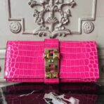 HERM Medor Clutch Bag In Rose Red Crocodile