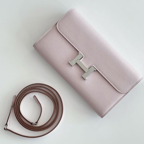 hwoc2epmp_1800x1800_c1aa5fb4-063d-4efa-ae7f-e385d69536bb-1.jpg HERM Constance To Go Wallet in Mauve Pale - Image 1
