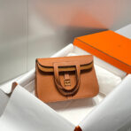 HALZAN 25 HANDLE BAG IN DULL ORANGE GRAINED