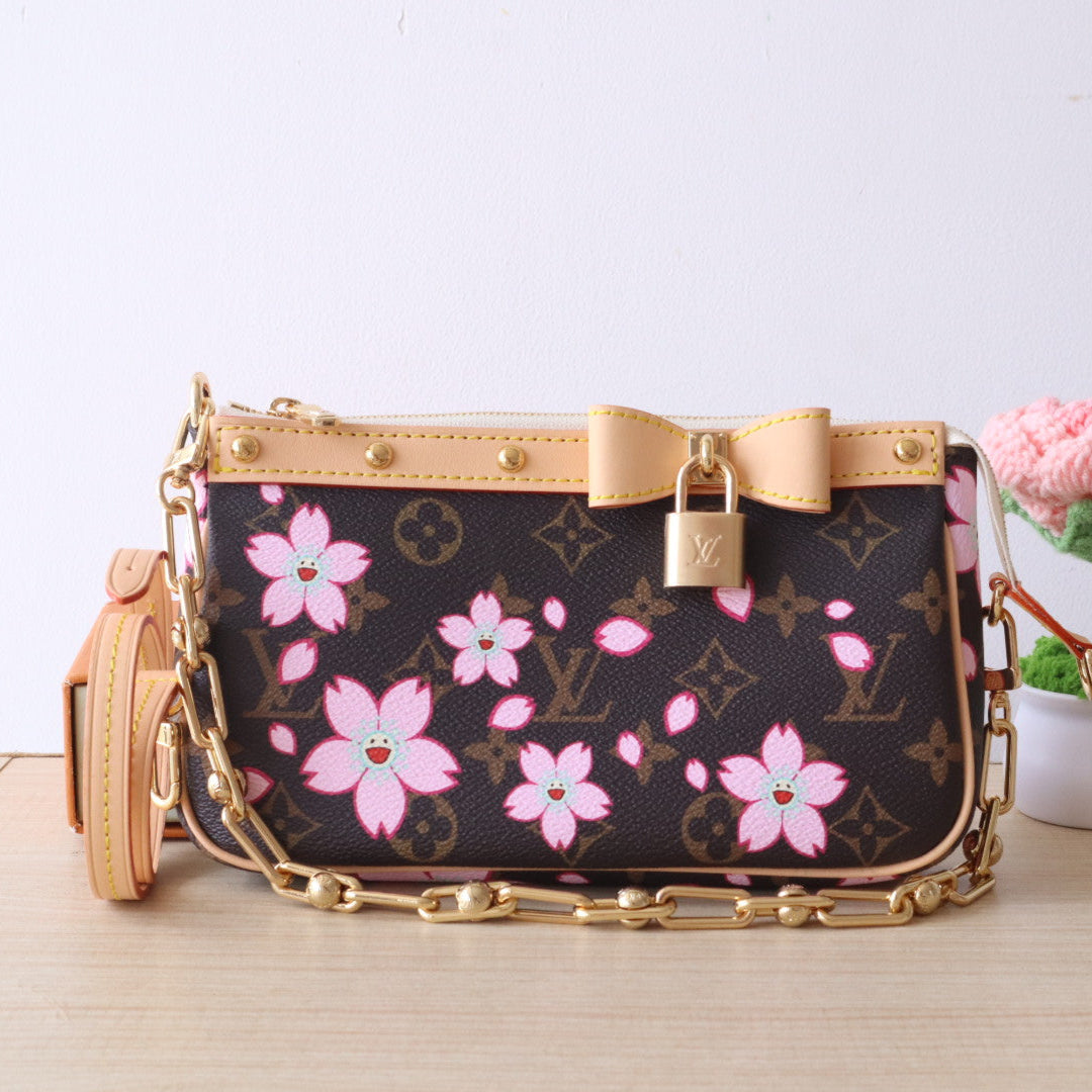 img_9363eb03_20250416_i1744775833664_7926_0_1_jpg_1800x1800_daf044d1-f308-45e7-80eb-06d7a960067a.jpg POCHETTE ACCESSOIRES BAG 22 IN SAKURA BROWN MONOGRAM COATED CANVAS - Image 1