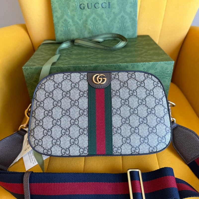 20230714_i1689316847_1618_0_jpg_1800x1800_02858ffa-6062-474f-b9c1-b2353726b7d3.jpg GG OPHIDIA SMALL 24 IN BEIGE CANVAS AND BROWN - Image 1