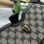 MOON SIDE SHOULDER BAG 24 IN BEIGE CANVAS AND BLACK LEATHER TRIM - Image 10